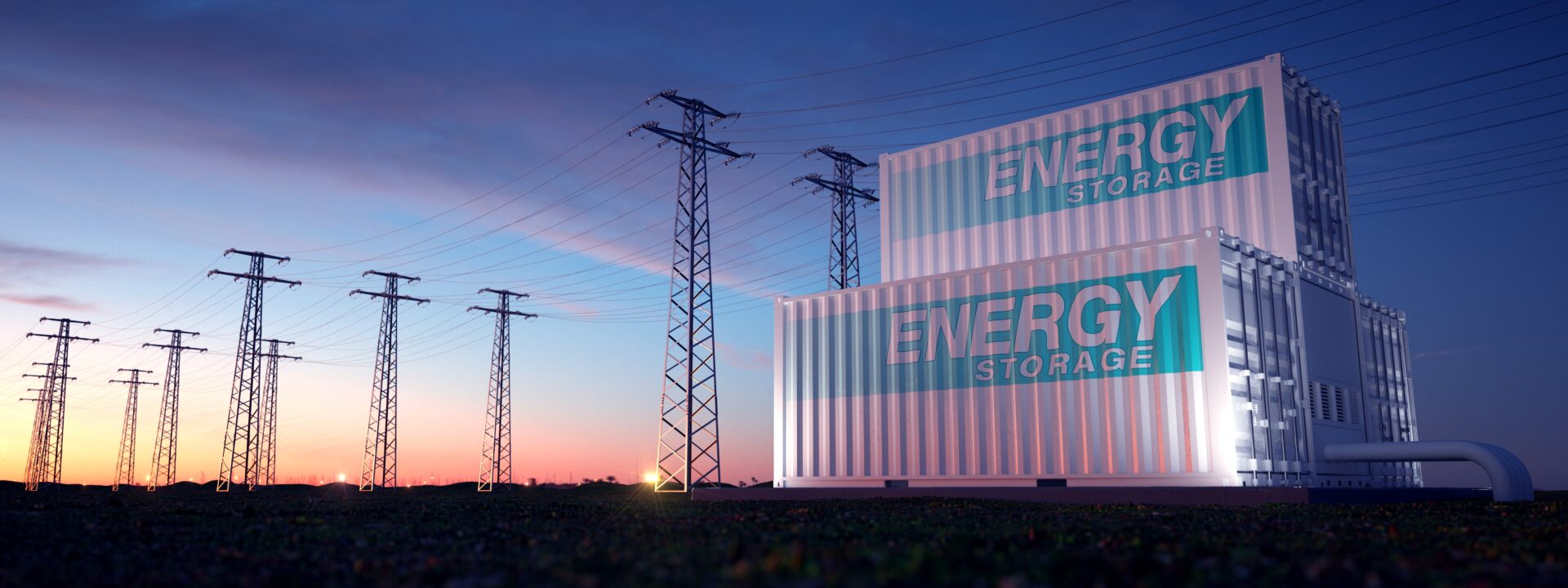 A couple of large containers sitting in the grass.